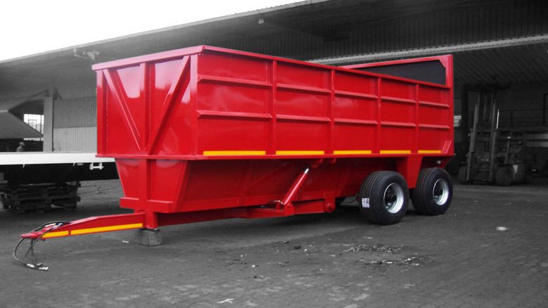 Grain drawbar trailer painted red